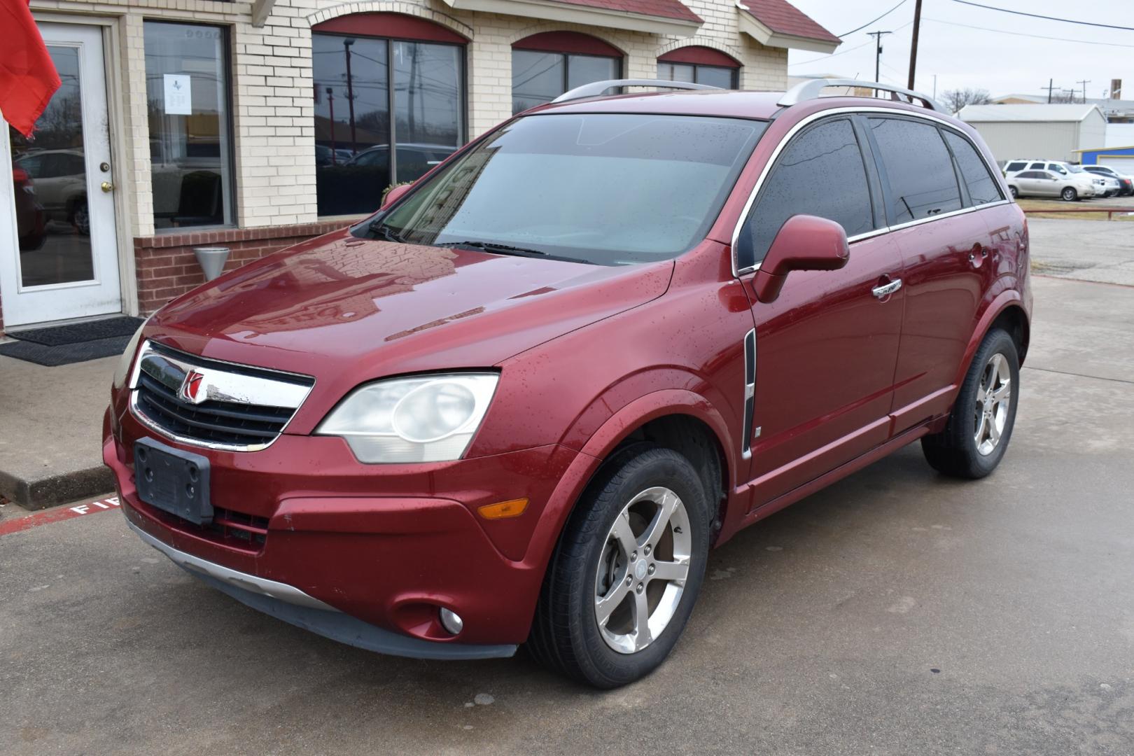 2009 Red /Tan Saturn VUE (3GSCL53P69S) with an L4, 2.4L engine, AUTOMATIC transmission, located at 5925 E. BELKNAP ST., HALTOM CITY, TX, 76117, (817) 834-4222, 32.803799, -97.259003 - Deciding whether to buy a specific car, like a 2009 Saturn VUE SUV, depends on various factors, including your preferences, needs, budget, and the condition of the specific vehicle you're considering. Here are some potential reasons you might consider when evaluating the 2009 Saturn VUE: Price: If - Photo#1